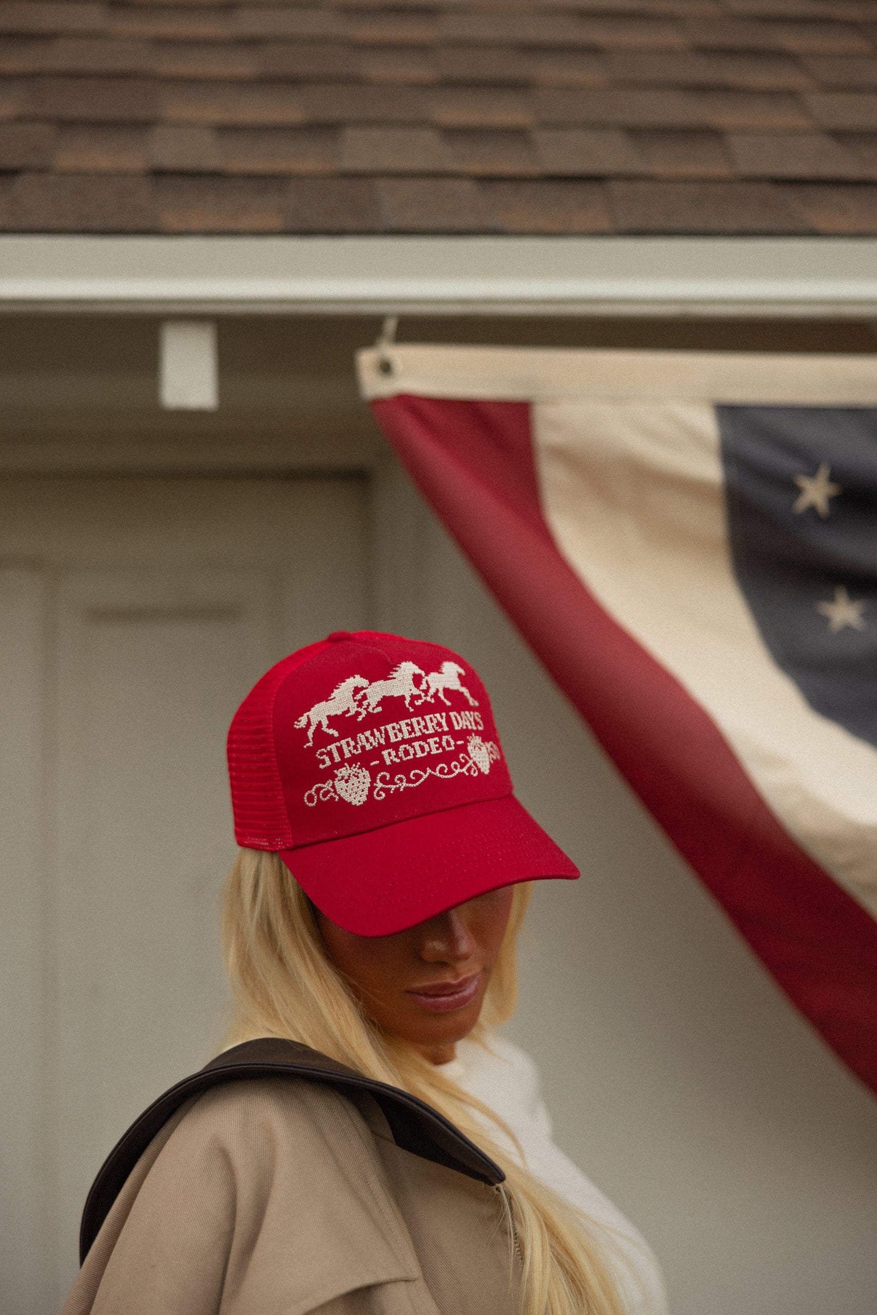 Red Strawberry Days Rodeo trucker hat